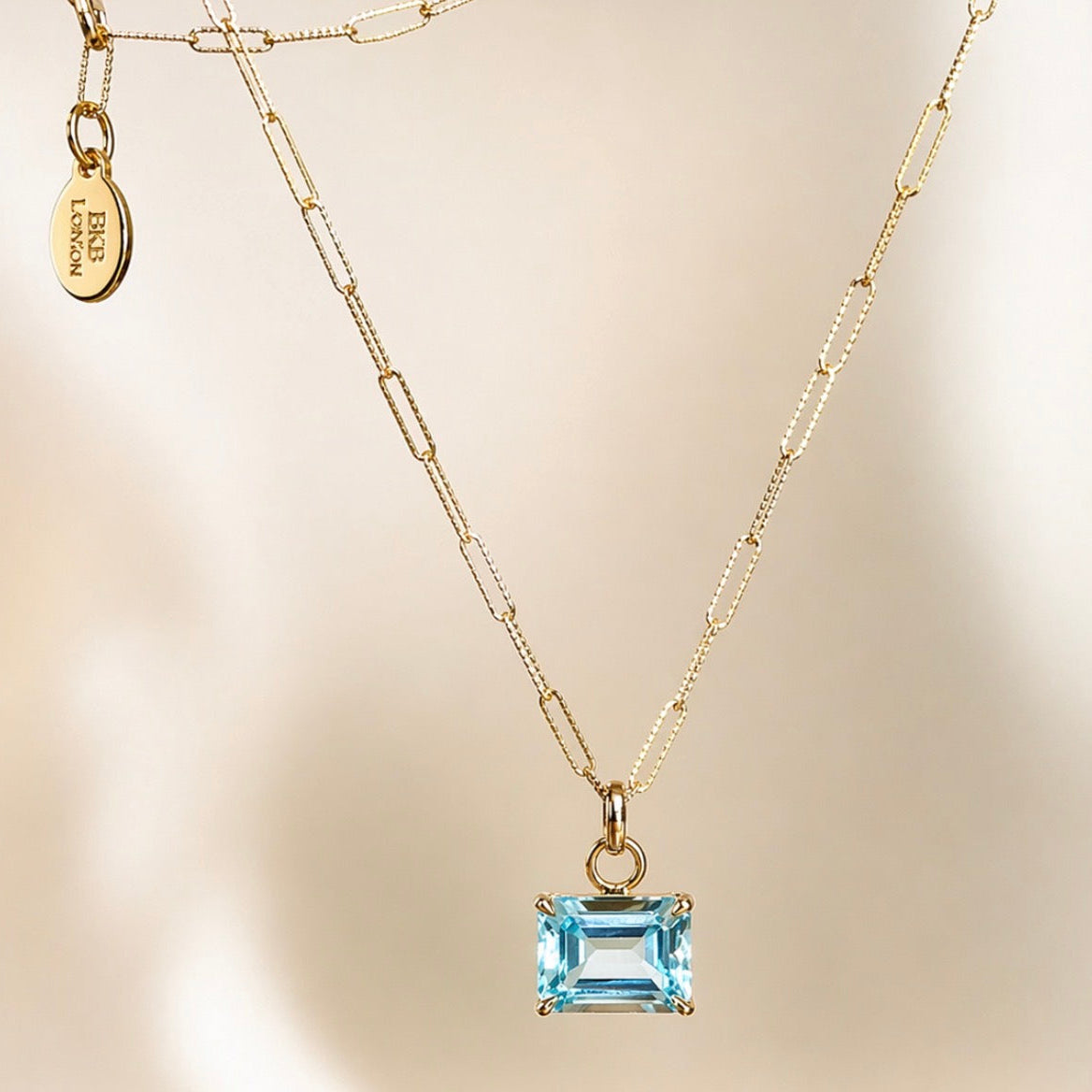 Riva, sky blue Topaz necklace in 9ct yellow gold