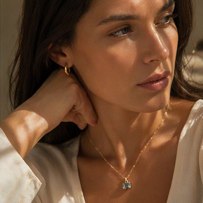 Riva, sky blue Topaz necklace in 9ct yellow gold