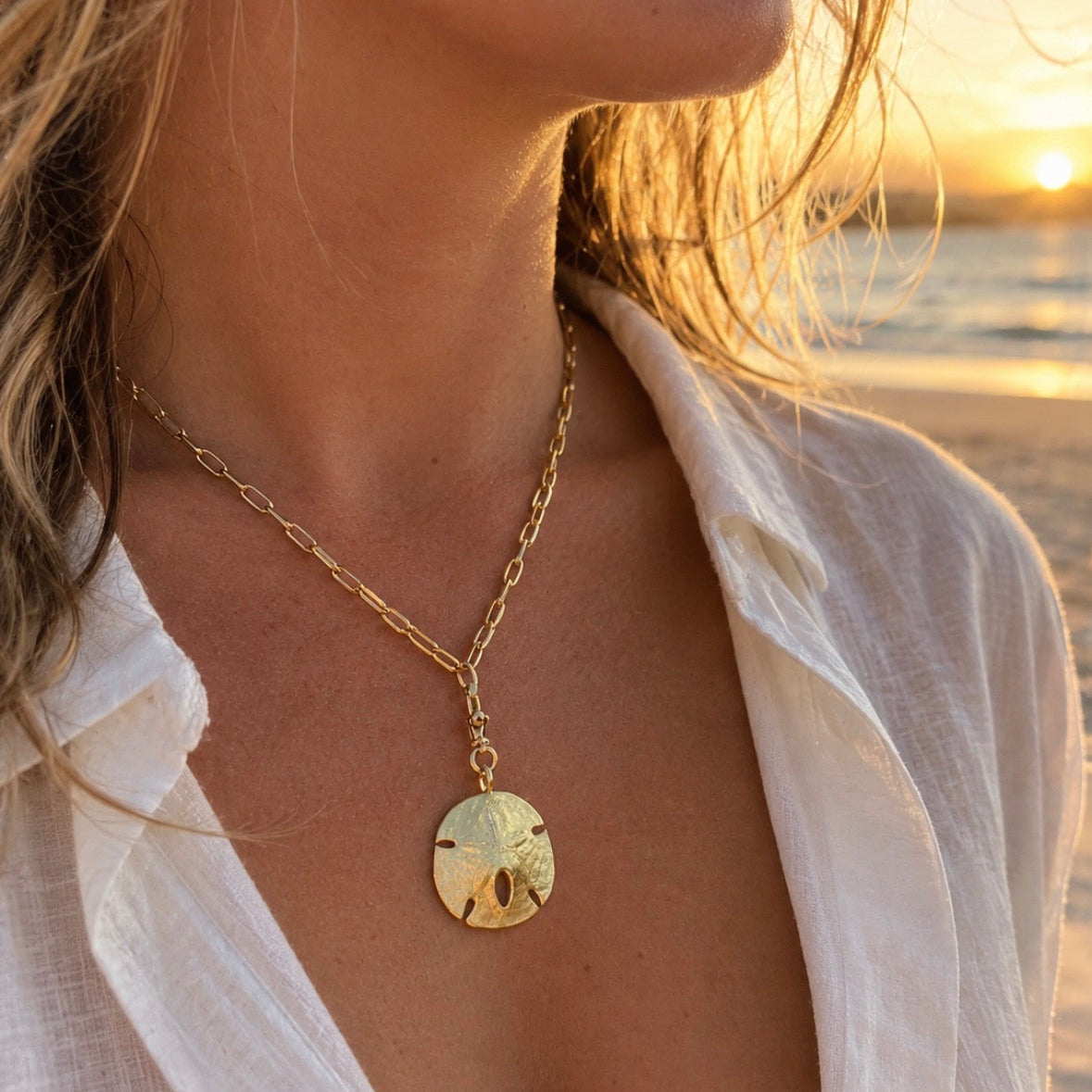 Sandollar necklace shown on chunky chain 