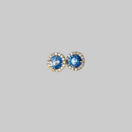 A pair of sapphire stu earrings with the diamond hallo in 18ct gold